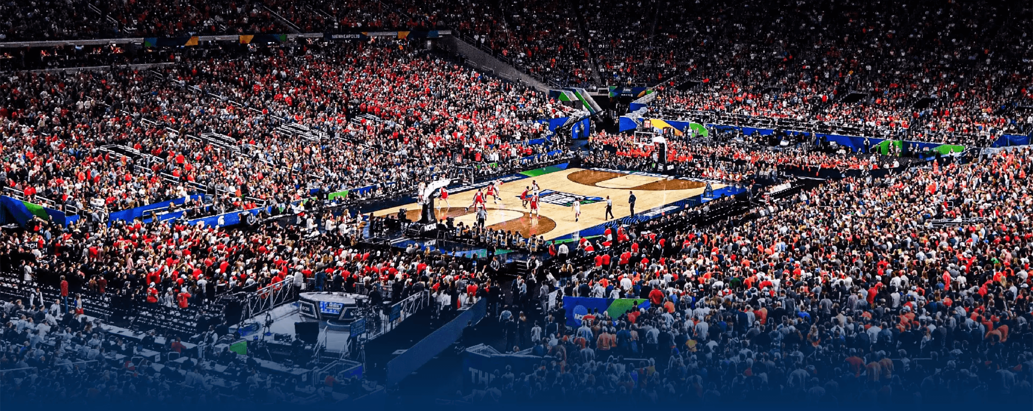 Packed basketball arena during collegiate game